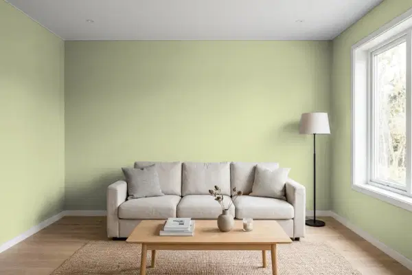 Living room with walls painted Benjamin Moore Burgess Green CW-485 (simulated)