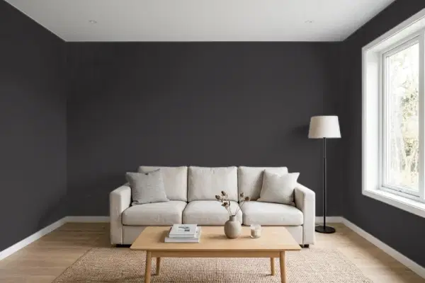 Living room with walls painted Benjamin Moore Carbon Copy 2117-10 (simulated)