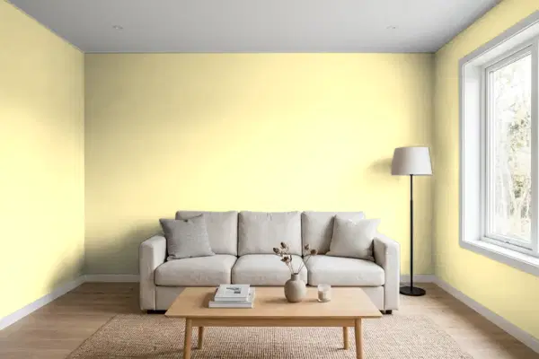 Living room with walls painted Benjamin Moore Corn Silk CC-218 (simulated)