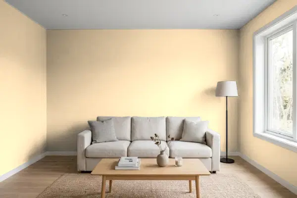 Living room with walls painted Behr Cream Custard M270-3 (simulated)