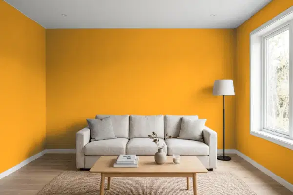 Living room with walls painted Benjamin Moore Gold Mine 2155-20 (simulated)