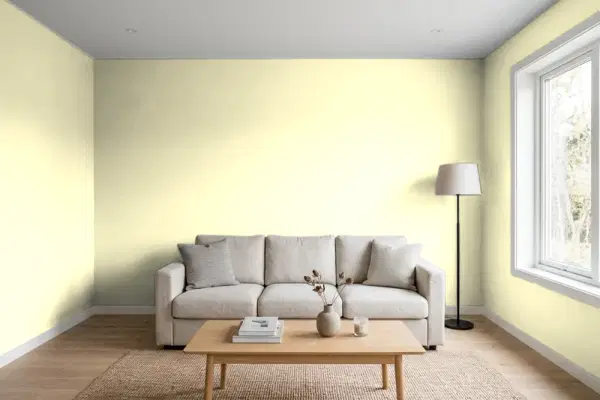 Living room with walls painted Benjamin Moore Lemonade 2024-60 (simulated)