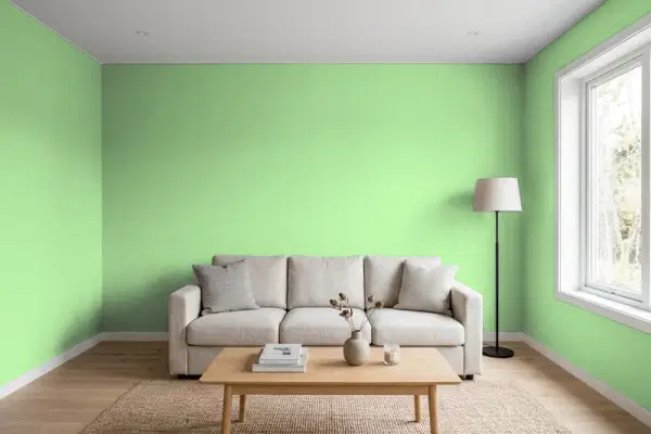Living room with walls painted Benjamin Moore Paradise Hills Green 550 (simulated)