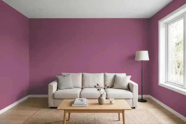 Living room with walls painted Behr Raspberry Crush M120-7 (simulated)