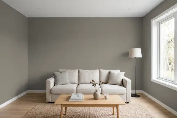 Living room with walls painted Behr Slippery Shale PPU24-06 (simulated)