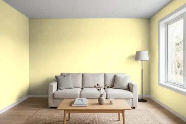 Living room with walls painted Benjamin Moore Yellow Lilies 346 (simulated)